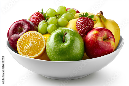 Colorful assortment of fruits in a large white bowl on a plain background