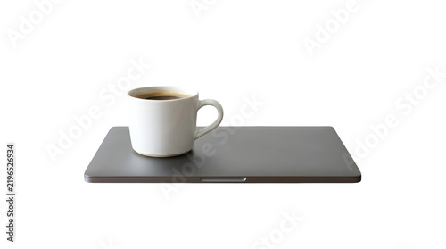 A white ceramic coffee cup placed on top of a closed dark grey laptop isolated on transparent background
