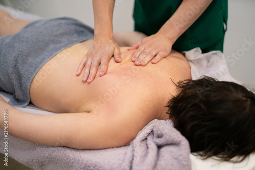 Professional back massage treatment in a spa or medical clinic