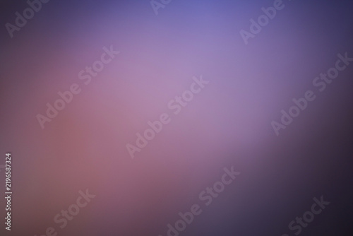 Abstract blurred background with soft purple and dark blue gradient tones