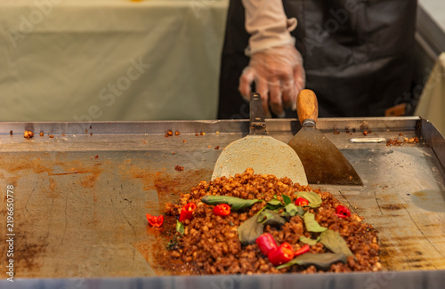 Photography Traditional Asian food and snacks arranged for sale at a busy street food stall in Shanghai, China