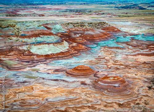 Aerial view reveals colorful Bentonite Hills badlands at dawn Utah