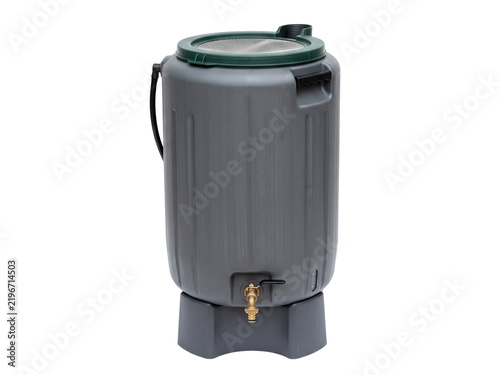 Grey plastic rain barrel with a spigot isolated on a white background