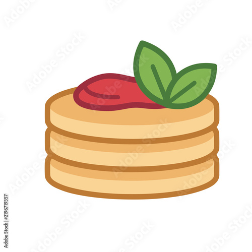 Stack of pancakes with jam and mint leaves