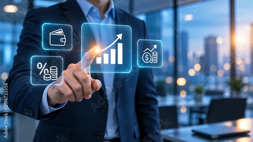 Businessman touching virtual screen with financial growth charts and investment icons in modern office.