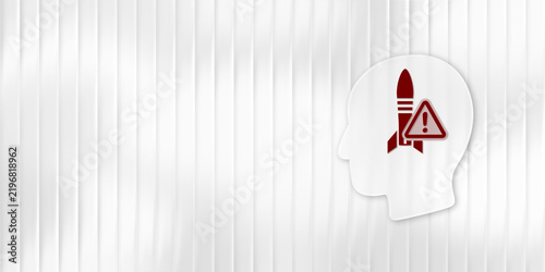 Foto Nuclear threat concept silhouette head with rocket and warning symbol showing mi
