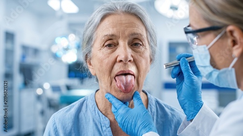 Senior woman undergoing a medical examination of her oral health by a professional doctor in a clinic