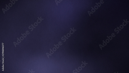 Dark grainy midnight background with violet radial gradient, soft vignette, matte surface texture and subtle film noise for abstract backdrop designs