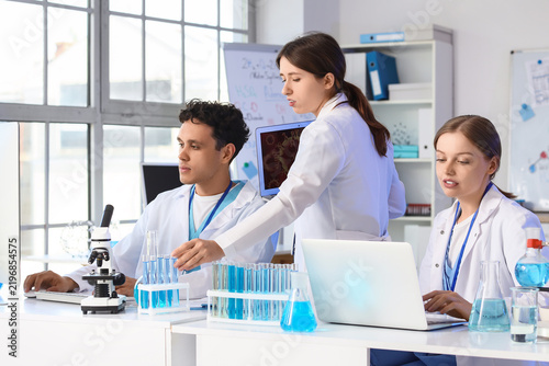 Scientific research and medical innovation, diverse team of scientists workin...
