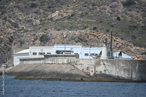 Military Naval Base with the Top of a Ship Showing Radar and Antennas