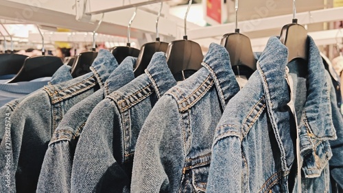 Obraz na płótnie Denim Jackets on Clothing Store Rack