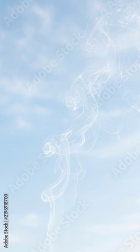 Soft Blue Sky with Wispy Clouds and Sunlight.