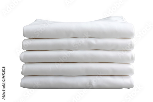 Six soft white fabric pieces folded into a tall pile