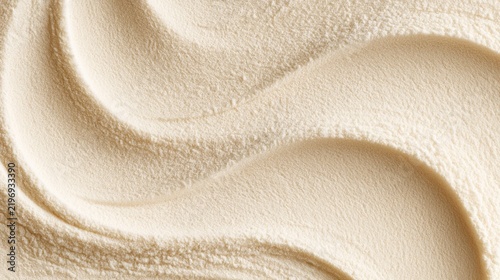 Smooth creamy texture with soft wave patterns for elegant background design