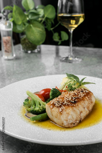Принти на полотні asian style fusion cod fillet with vegetables and sweet sesame ginger sauce on r