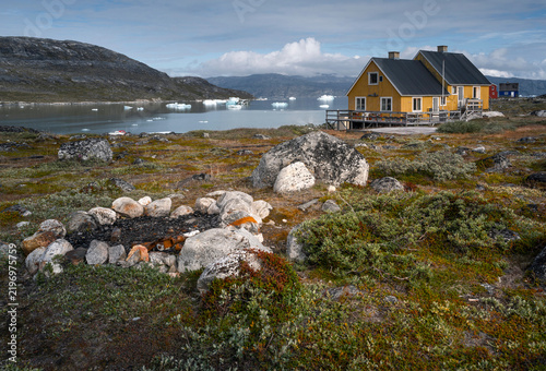 Qoornoq village with floating icebergs in Nuuk fjords, Greenland
