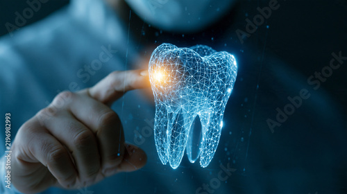 A dentist touches a glowing digital 3D tooth hologram in a dark lab. Modern dental technology concept for medical research and health insurance marketing.