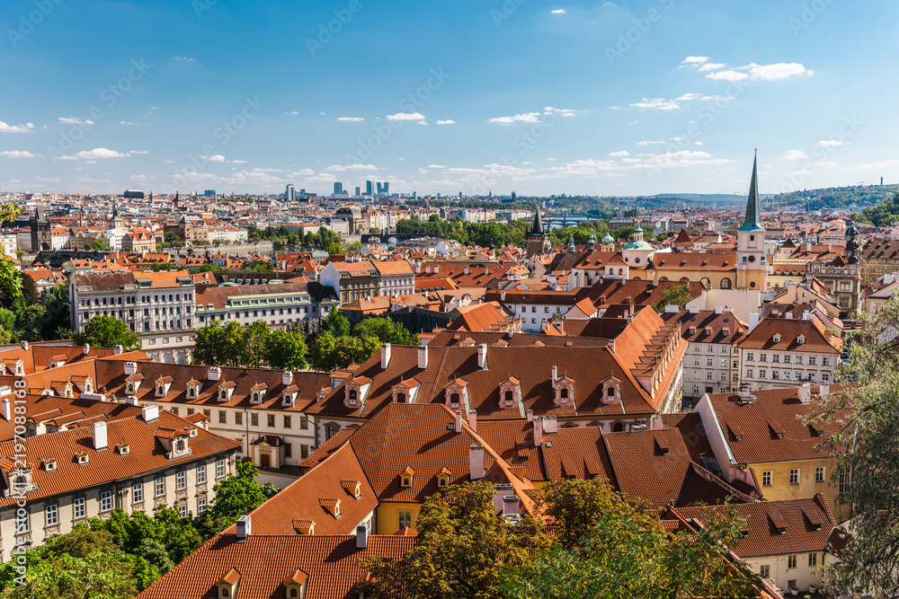 Obraz premium Prague Cityscape Over Historic Red Rooftops in the Czech Republic
