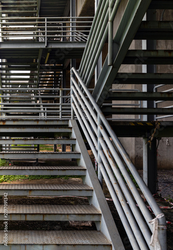 Contemporary Urban Architecture Featuring External Modular Steel Stairs with Geometric Metal Railings.