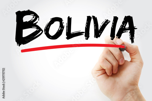 BOLIVIA text on glass written by hand. Bolivia is a landlocked country in central South America, famous for its varied terrain spanning Andes Mountains and Amazon basin
