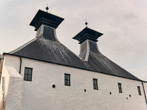 Obraz na płótnie Whisky production and heritage iconic pagoda kiln roofs at Ardbeg Distillery in