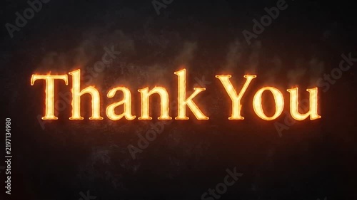 Thank you Flames rise from the ground as embers glow in the dark, showing a fire event at night in a rocky area