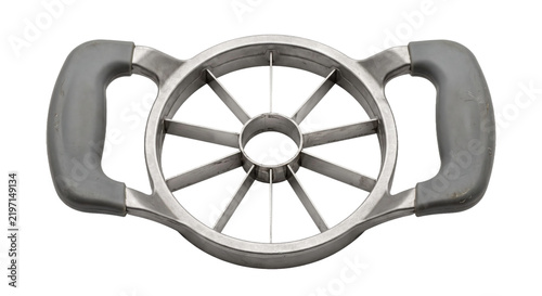 Fotografie Silver metal apple corer and slicer with gray handles is positioned horizontally