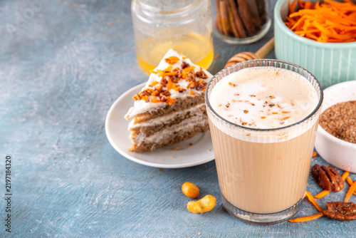 Tasty autumn carrot cake or carrot spice coffee latte