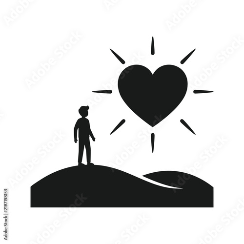 Silhouette of a person looking at a radiant heart symbol.