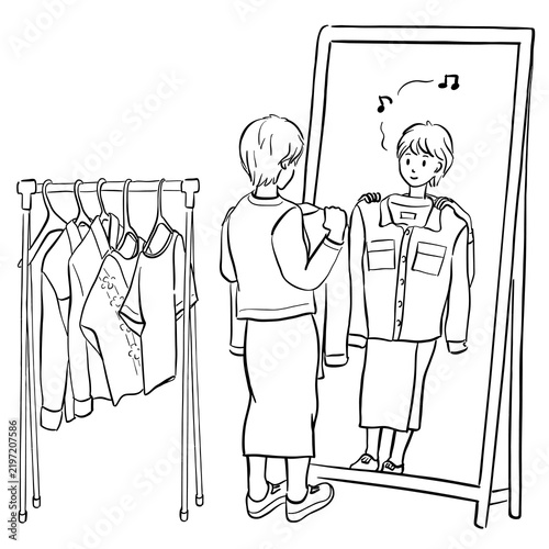 鏡を見て服を選ぶ若い女性　1色