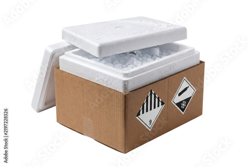 Insulated styrofoam cold chain bio shipper on transparent background, thermal foam shipping box in corrugated carton with biohazard warning labels. Pharmaceutical transport delivers delivery.