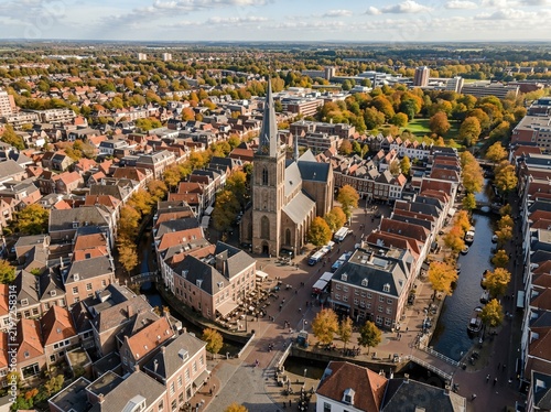 From above, a sweeping aerial panorama captures Enschede’s historic town on a bright autumn afternoon in the Netherlands
