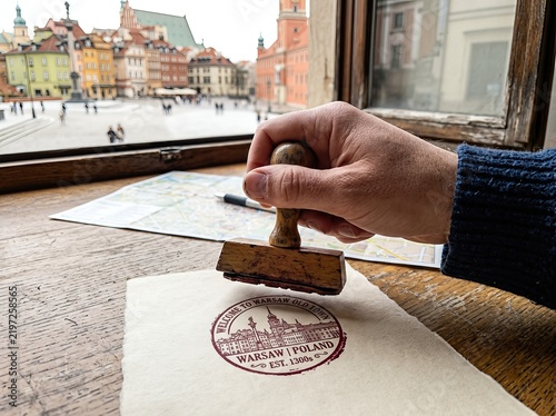 Discover a rubber stamp design featuring Warsaw's Old Town and its historic architecture