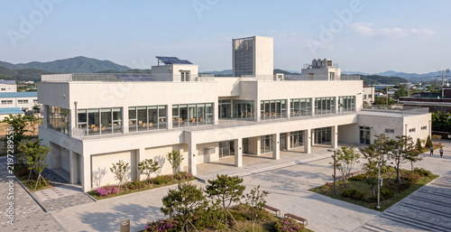 3d architectural rendering of a modern educational facility in the park
