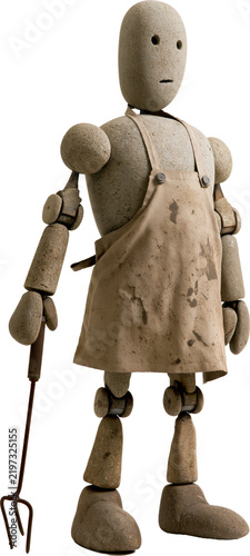 Stone robot holding garden fork