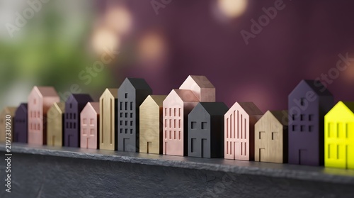 Assortment of small decorative houses in various colors.
