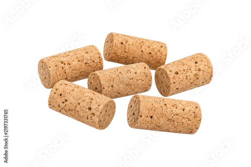 Bild auf Leinwand Collection of natural cork wine stoppers with detailed porous texture isolated on a clean white background, sustainable bottle closures for winery, beverage packaging, and winemaking concepts