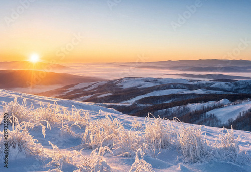 Sunrise over frozen mountains