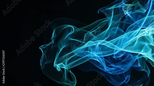 Abstract blue smoke light leak flowing on black background