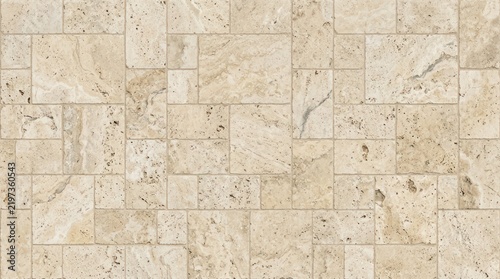 Close up of beige stone wall tiles with textured natural surface