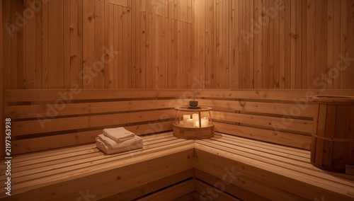 Sauna Interior With Wooden Benches and Lighted Candles
