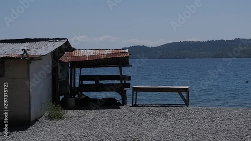 Scenic Coastal Landscape with Hut and Blue Sea