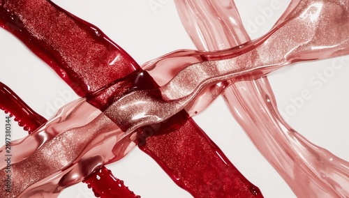 Different Kinds of Liquid Textures Arranged in a Crisscross Pattern on a Ligh...