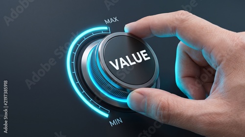 Hand turning a futuristic knob to maximize value concept