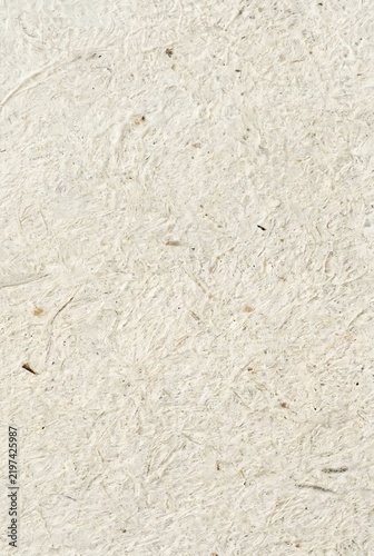 Off white paper texture background with empty space for text. Simple light cream color surface. Blank cardboard sheet	