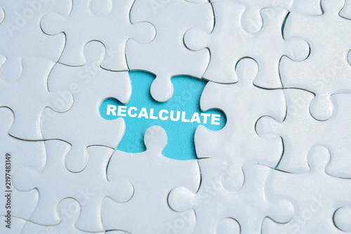 Piece of jigsaw puzzle recalculate phrase. For business strategy shift and course correction