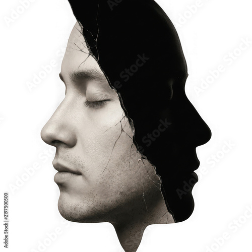 Conceptual portrait of a man with a cracked face revealing a dark silhouette, isolated on transparent background