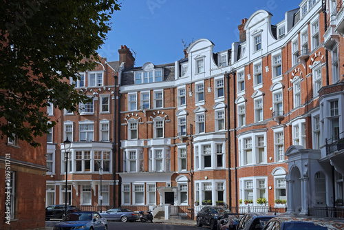 London, curved street with five story apartment buildings in Chelsea district