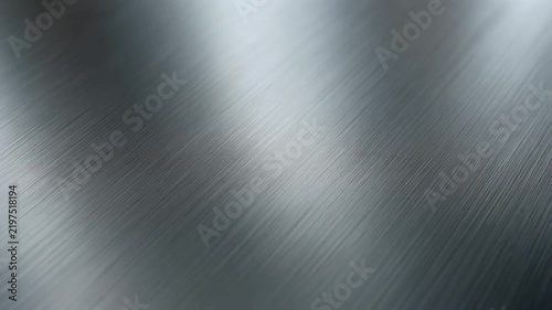 Brushed metal texture background with reflective silver steel surface and fine polished diagonal lines