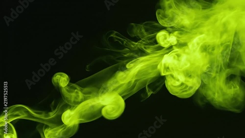 A glowing green chemical stream in darkness